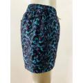 Blue and purple koi print men's beach shorts