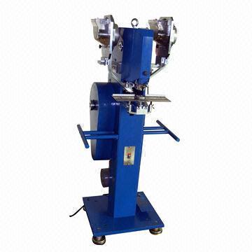 Automatic eyelet press machine with laser guiding light