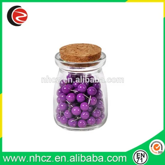 Round Purple Push Pin in glass bottle