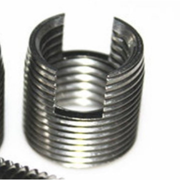 Self tapping slotted screw thread insert