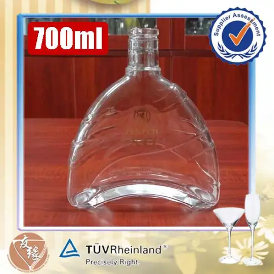 China custom brand name 70cl hot selling super white glass empty clear spirit glass bottle with cork