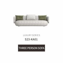 Contemporary three-seater fabric sofa