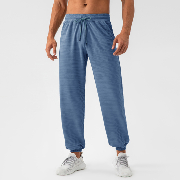 Benutzerdefinierte hochwertige Herren -Flarger -Jogger -Trackhose mit Flacking -Elastizitätsbund und gestapeltem Flare -Design