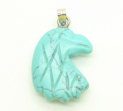 Pendentif en forme de tête de turquoise