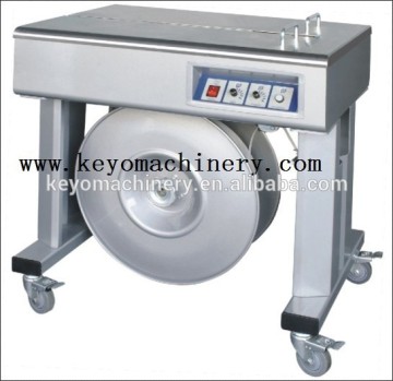 Manual strapping machine