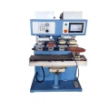 Pad printer with shuttle for plastics plate