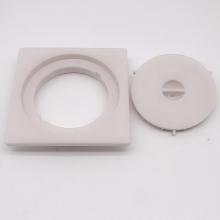 White Plastic bathroom floor drain with removable cover