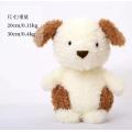 Brown and white puppy stuffed animal