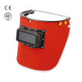 hand-held red steel paper welders helmet