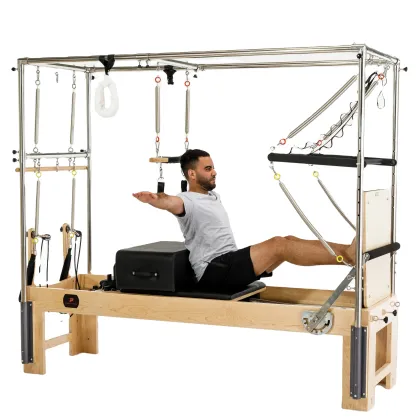 White Full Trapeze Combination Pilates Studio with Wood Pilates Reformers and Cadillac