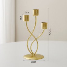 Маляўнічыя металічныя ўладальнікі свечак і ўладальнік моднай свечкі