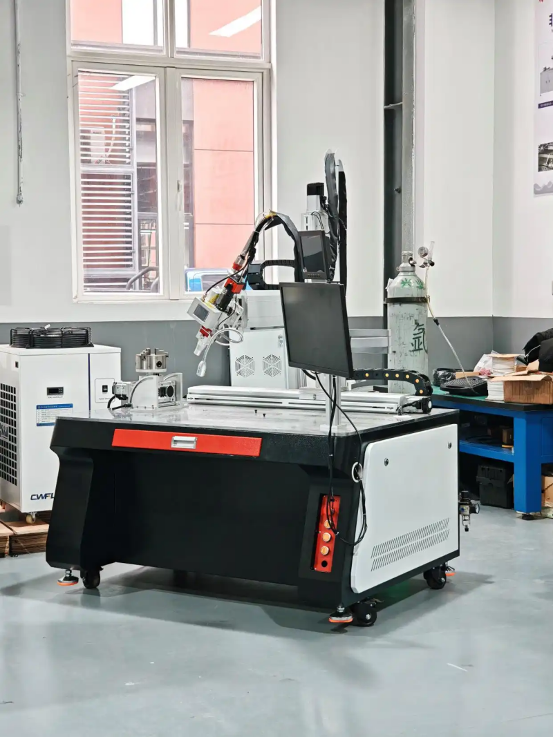 a fiber laser source and a proprietary CNC system