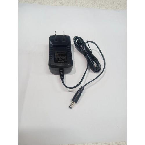 A bharrachd air an adanter AC-DC