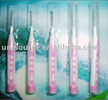 Interdental brush in blister card packing