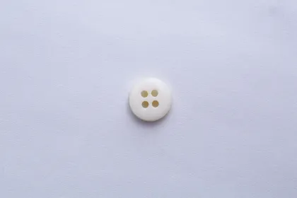 Transparent buttons on the bottom of the shirt