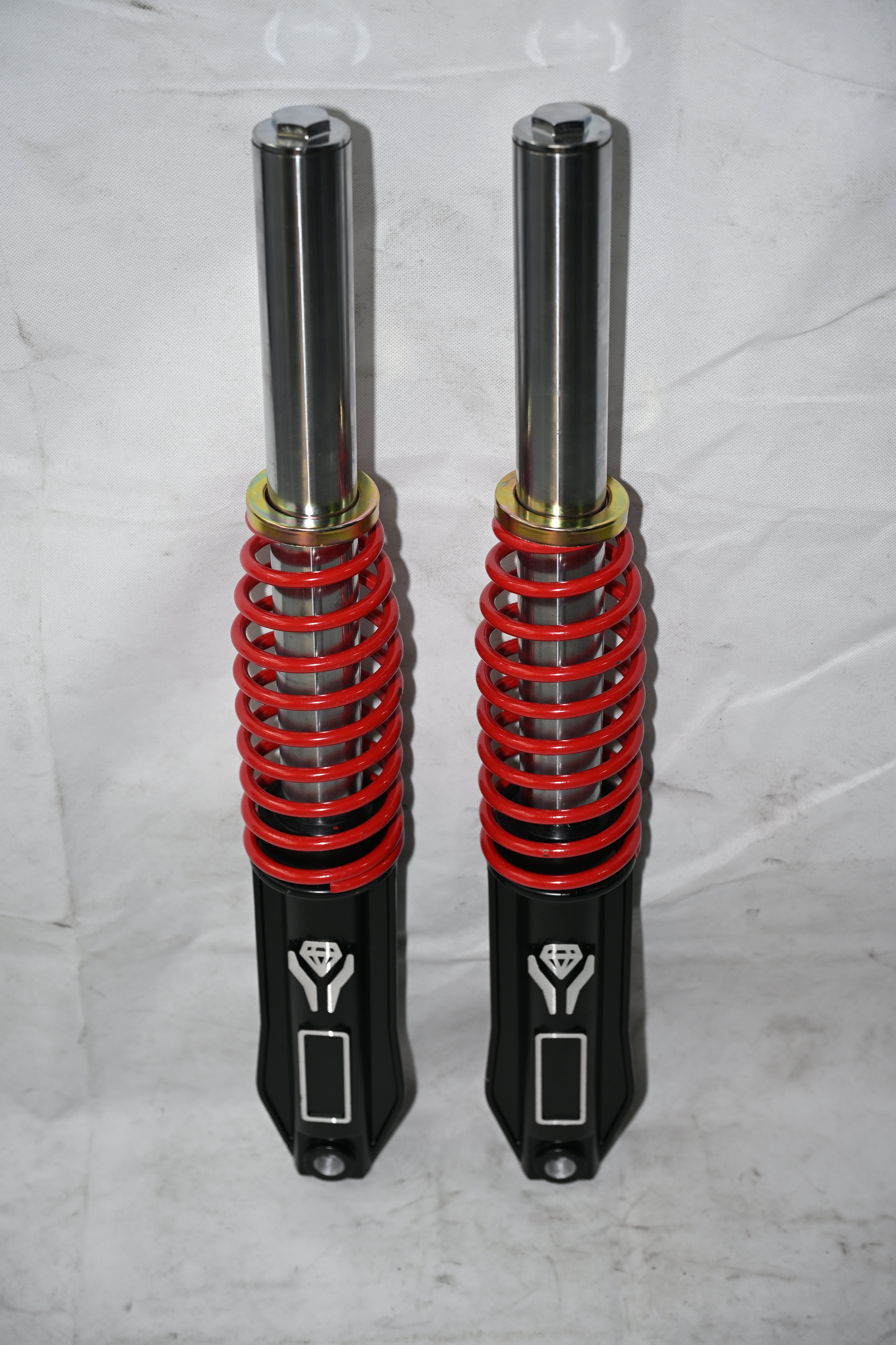 External spring shock absorber