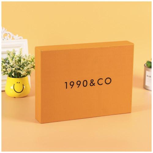 Boîte de tiroir en papier de texture orange avec logo UV