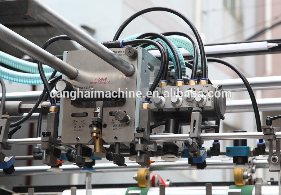 Corrugated paperboard laminating machine