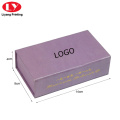 Kotak magnet ungu berbentuk buku dengan logo