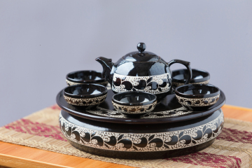 A set of fine black glaze flower picking tea set