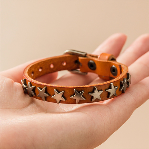 Decoración de estrellas esencial de la pulsera de cuero genuina estilo punk