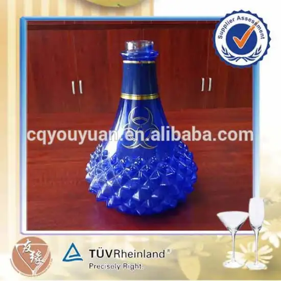 OEM ODM wholesale corkmouth unique embossed fluted spray coating blue glass bottle 70cl