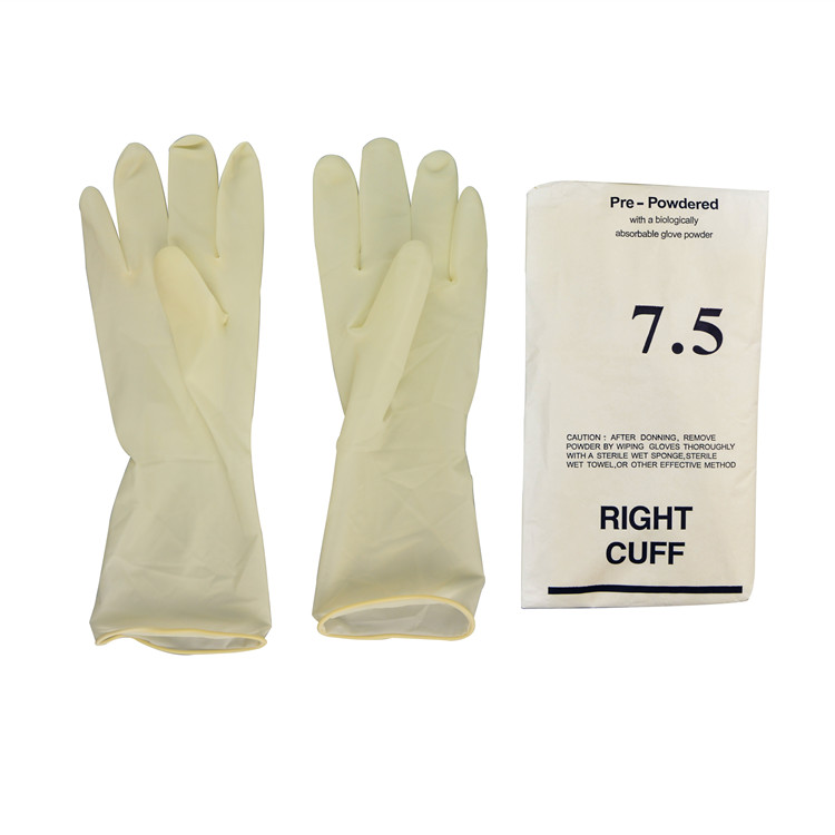 Surgical gloves with powder