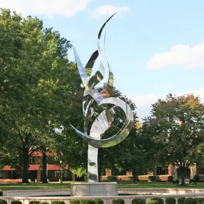 Abstract polished stainless steel pigeon sculpture