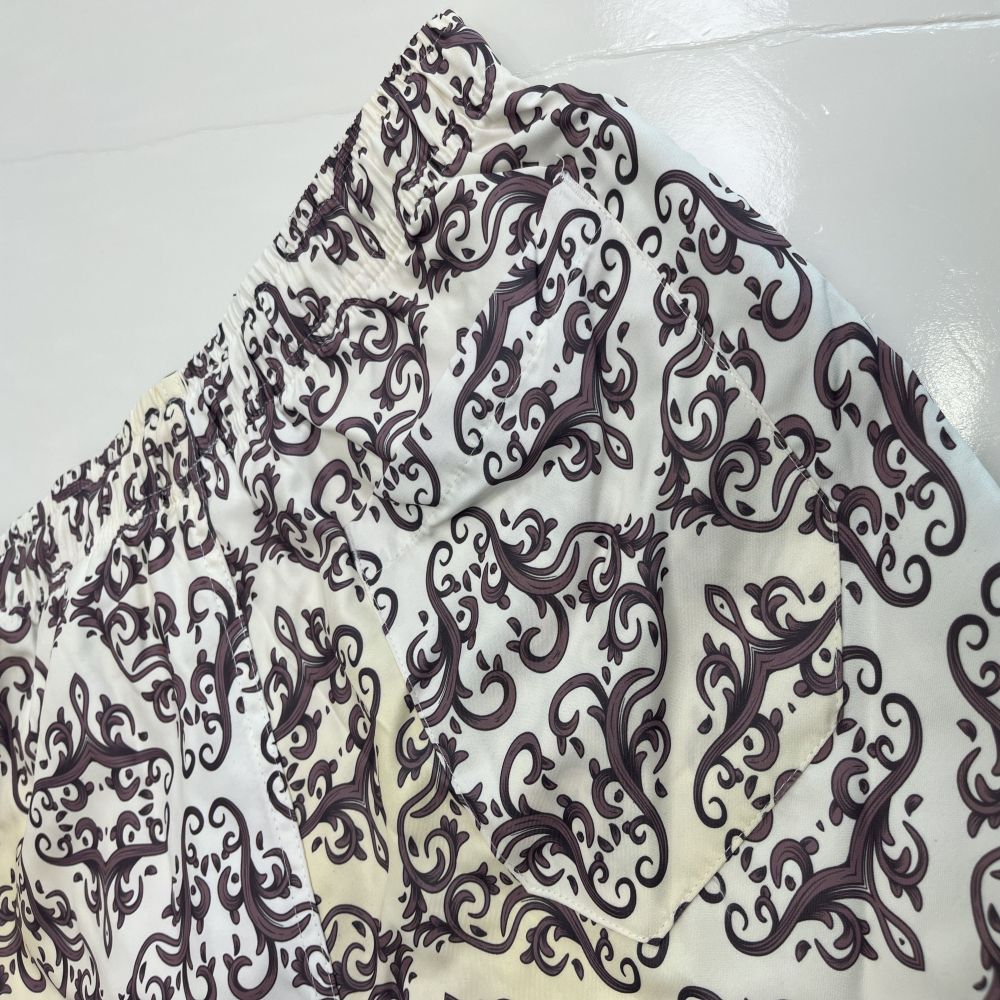 Benutzerdefinierte gedruckte schnelle trockene Polyester -Frauen -Board -Shorts