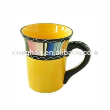 Handpainted ceramic mug with wide mouth in yellow