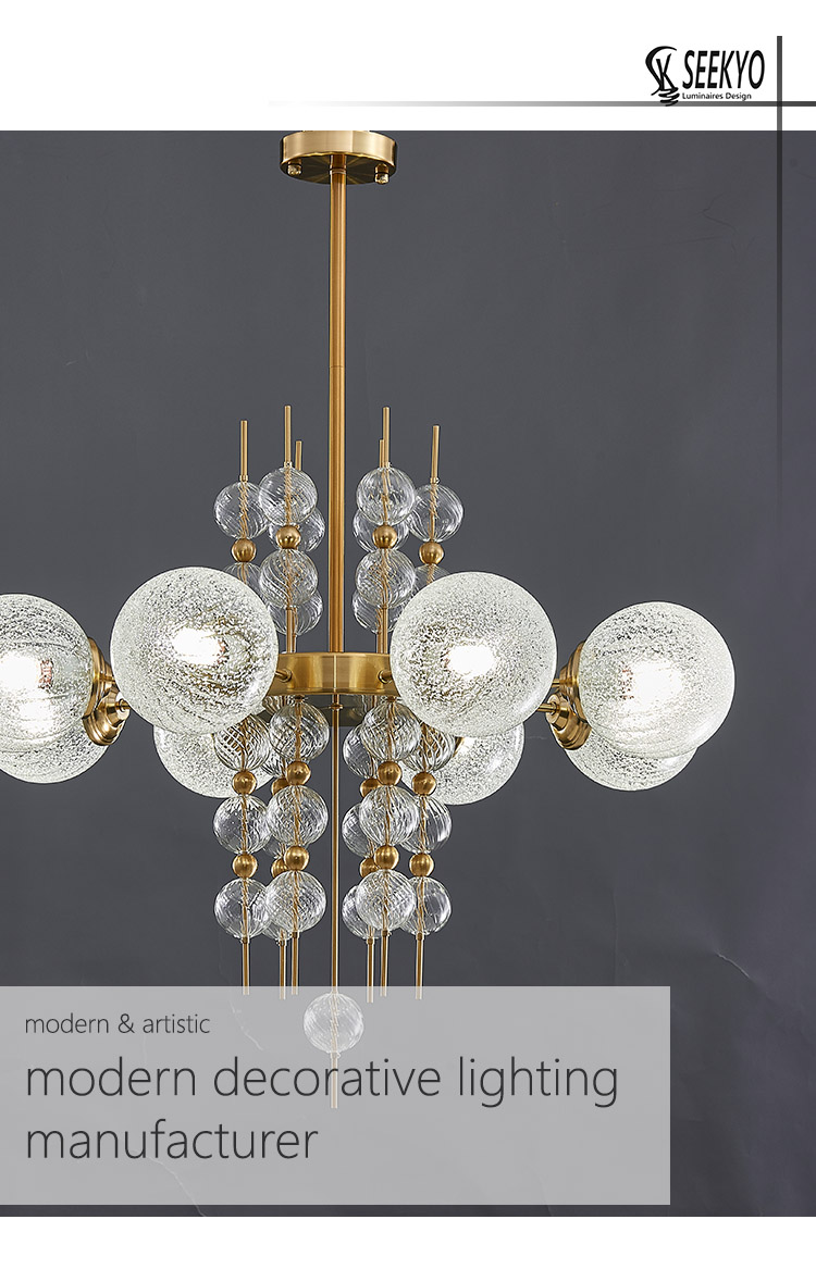 This mid-century luxury quartz sand glass shade gold chandelier is a stunning piece of home decor that will add a touch of glamour and elegance to any room. 