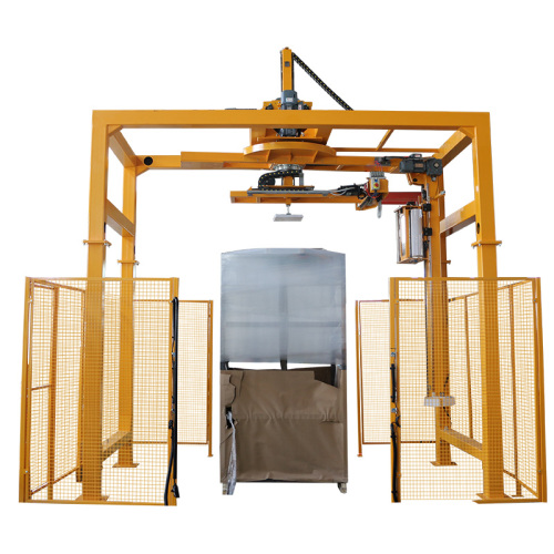 Integrated top sheet dispenser with pallet wrapper