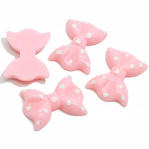 Hot Selling Flat Back Pink Bowknot geformte Harz Cabochon für handgemachte Handwerk Dekoration Perlen Charms