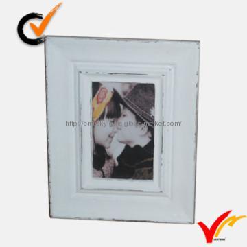 Shabby chic white wooden photo frame