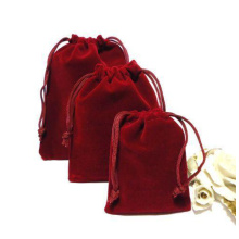 Red velvet jewelry pouch with red string