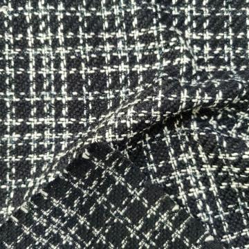 Diseño de boucle con tejido de lurex negro