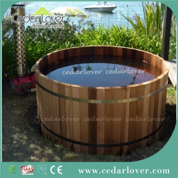 round wood fired cedar hot tub