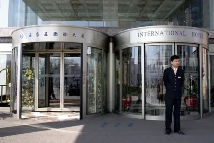 Automatic Sliding Door Operators for Revolving Doors