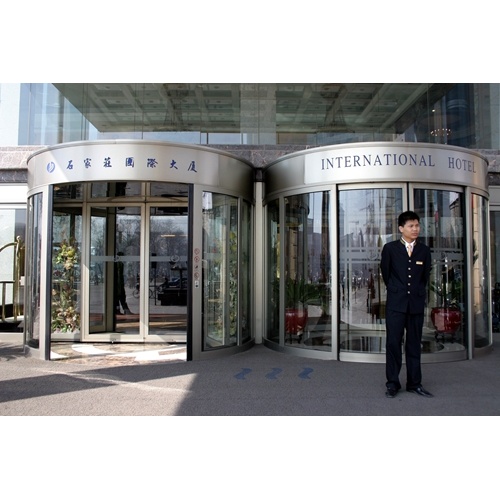 Automatic Sliding Door Operators for Revolving Doors