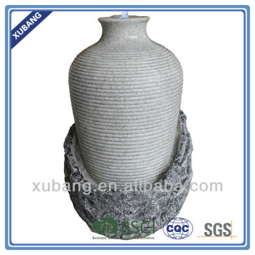 artifical bold strip tall jar with rocky base fountain decoration