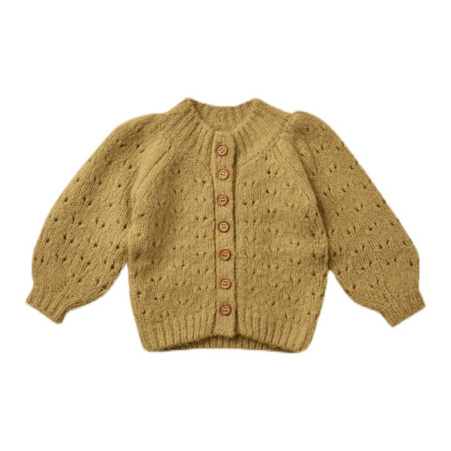 Suéter de punto de color sólido de manga larga para niñas.
