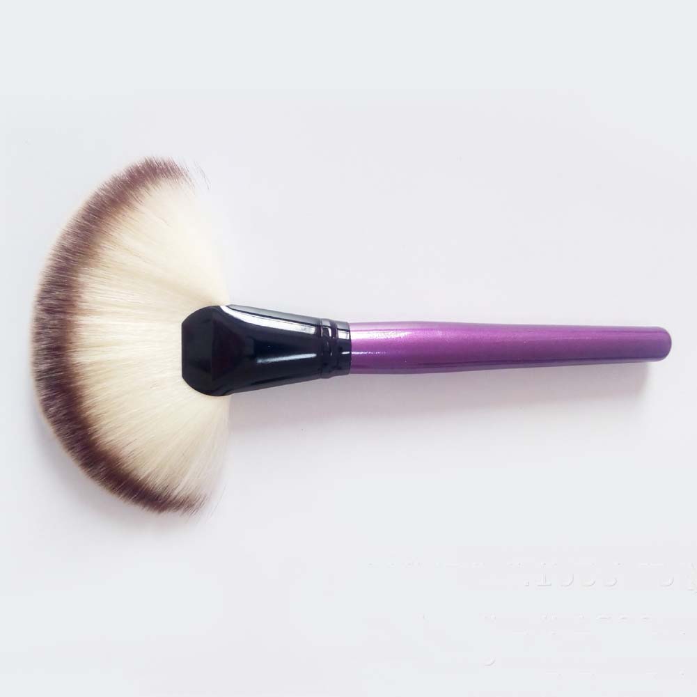 fan makeup brush