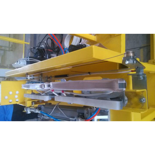 rotary arm and top dispenser pallet packaging line