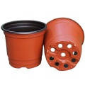 Pots de fleurs rouges en plastique rond