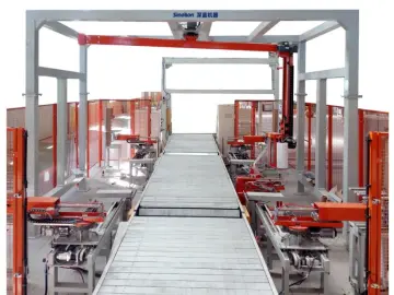 Rotary-arm wrapping machine with paper corner applicator