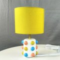 Resin base fabric shade decorative table lamp