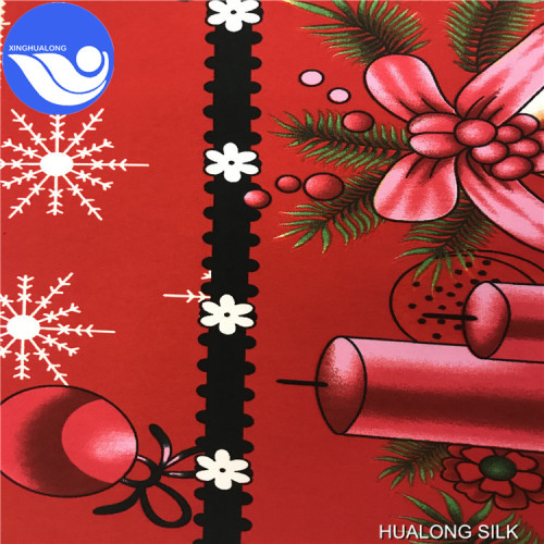Tessuto con mini stampa opaca di design natalizio