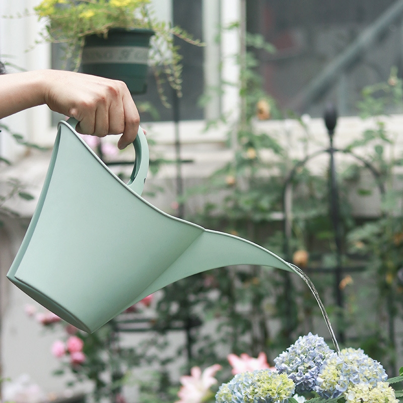 Long spout watering can