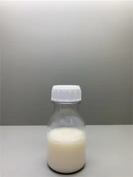 Softener flake for soft finishing of acrylic fibers