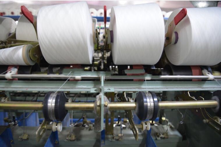 two for one twisting machine for short fiber